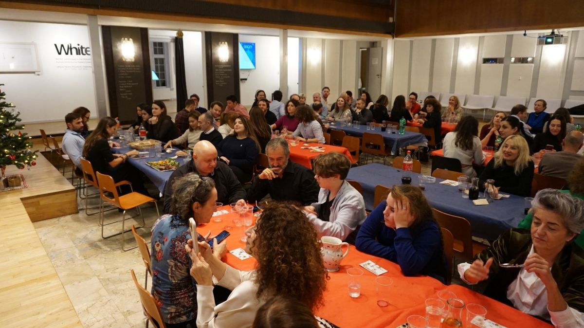 ARSID members at long tables during the Christmas dinner, 4 December 2025